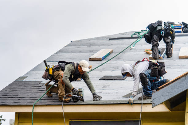Professional Gutter Installation technician working in Harvard, MA